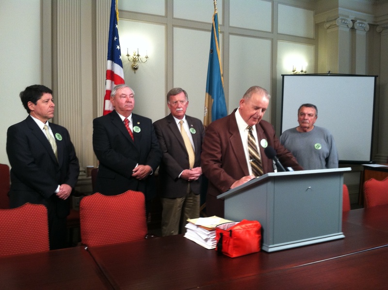 Sen. Bruce Ennis, D-Smyrna, introduced a bill April 30 that requires landowners to justify large lot rent increases for manufactured homeowners.Shown are (l-r) Rep. Paul Baumbach, D-Newark; Rep. William Carson, D-Smyrna; Sen. Brian Bushweller, D-Dover; Ennis; and Ed Speraw, president of Delaware Manufactured Homeowners Association. BY KARA NUZBACK